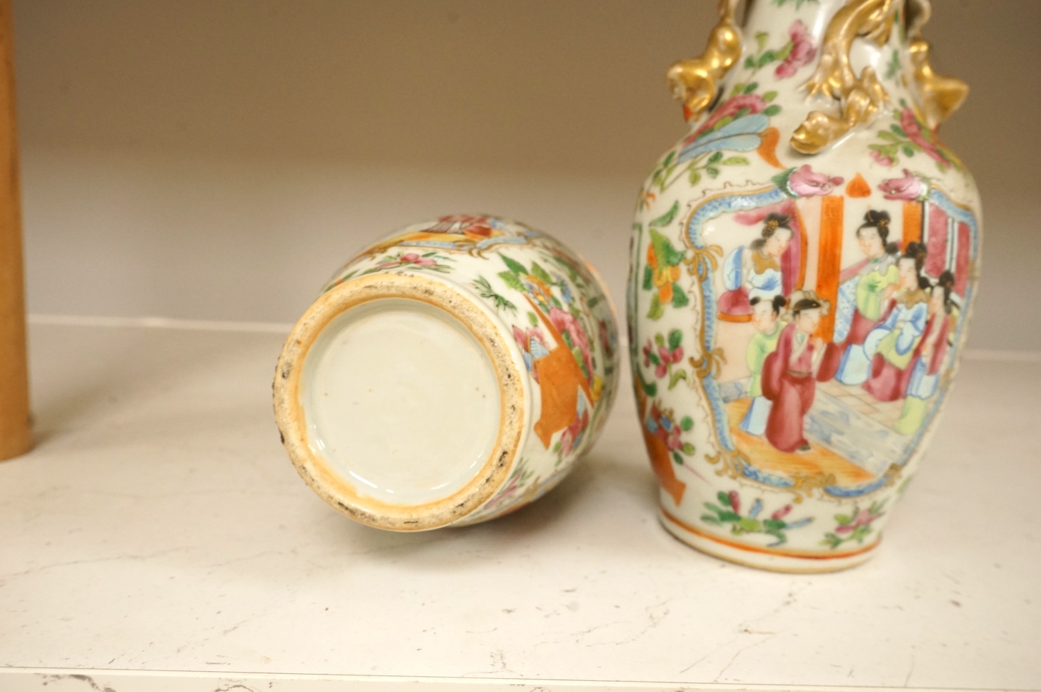 A pair of 19th century Chinese famille rose vases, 24cm